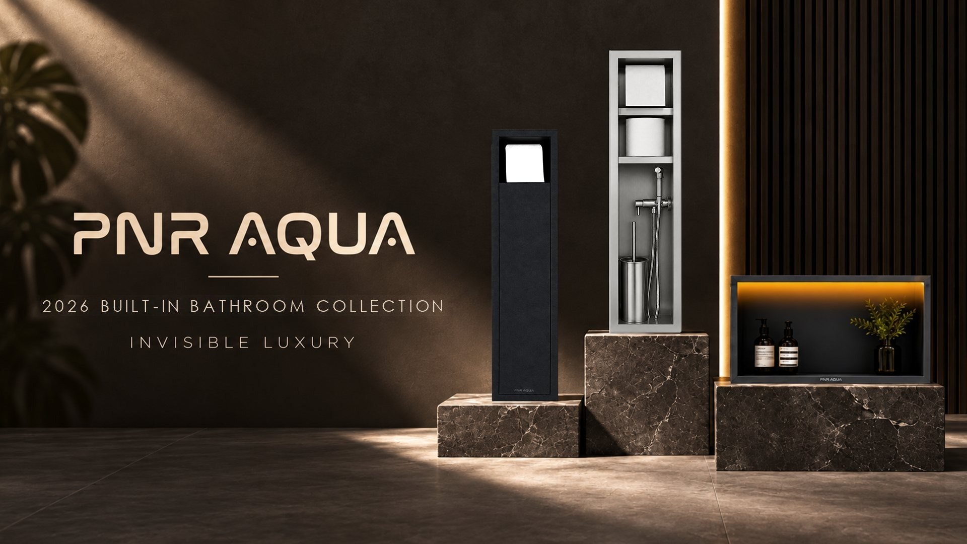 PNR AQUA — 2026 built-in bathroom collection, Invisible Luxury. Built-in toilet roll cabinets and an LED-lit niche on stone plinths.
